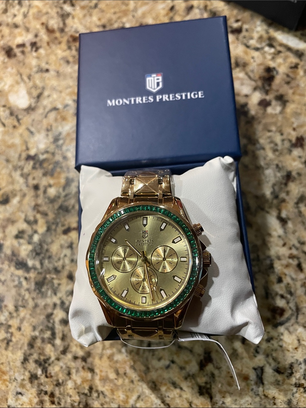 Montres Prestige Men’s Gold Chronograph Watch with Green Bezel